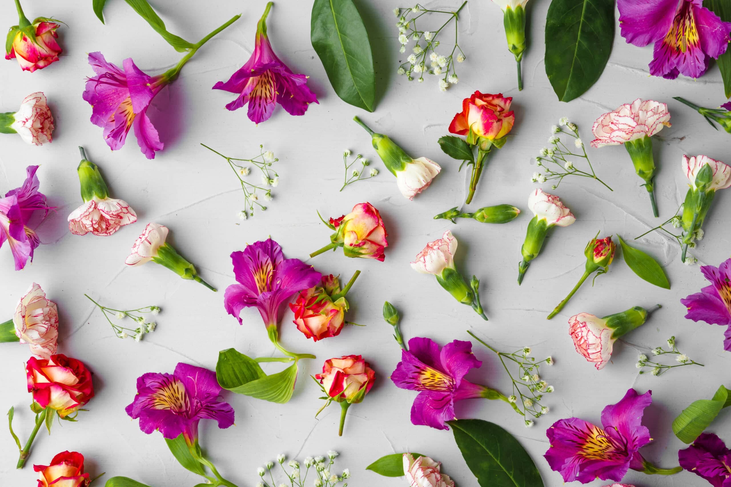 A bright arrangement of Heckers flowers and foliage